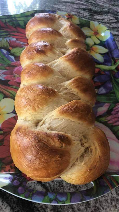 Golden and fluffy braided bread, a delightful treat for any occasion.